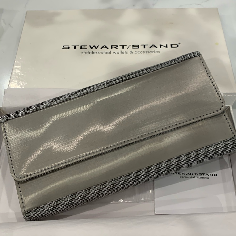 Stewart/Stand stainless steel wallet with tags.